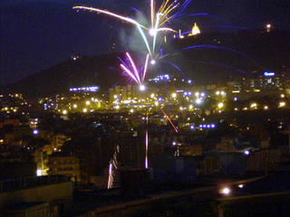 Sant Joan night, spontaneous fireworks in Horta district, Barcelona.